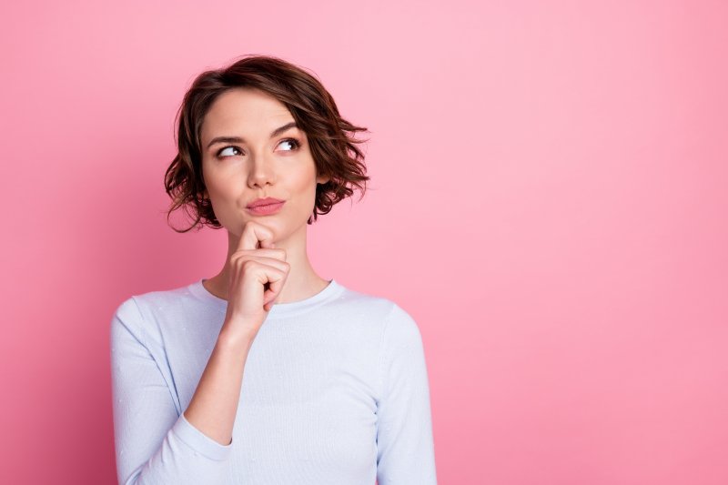 person wondering if you can get cavities with veneers 