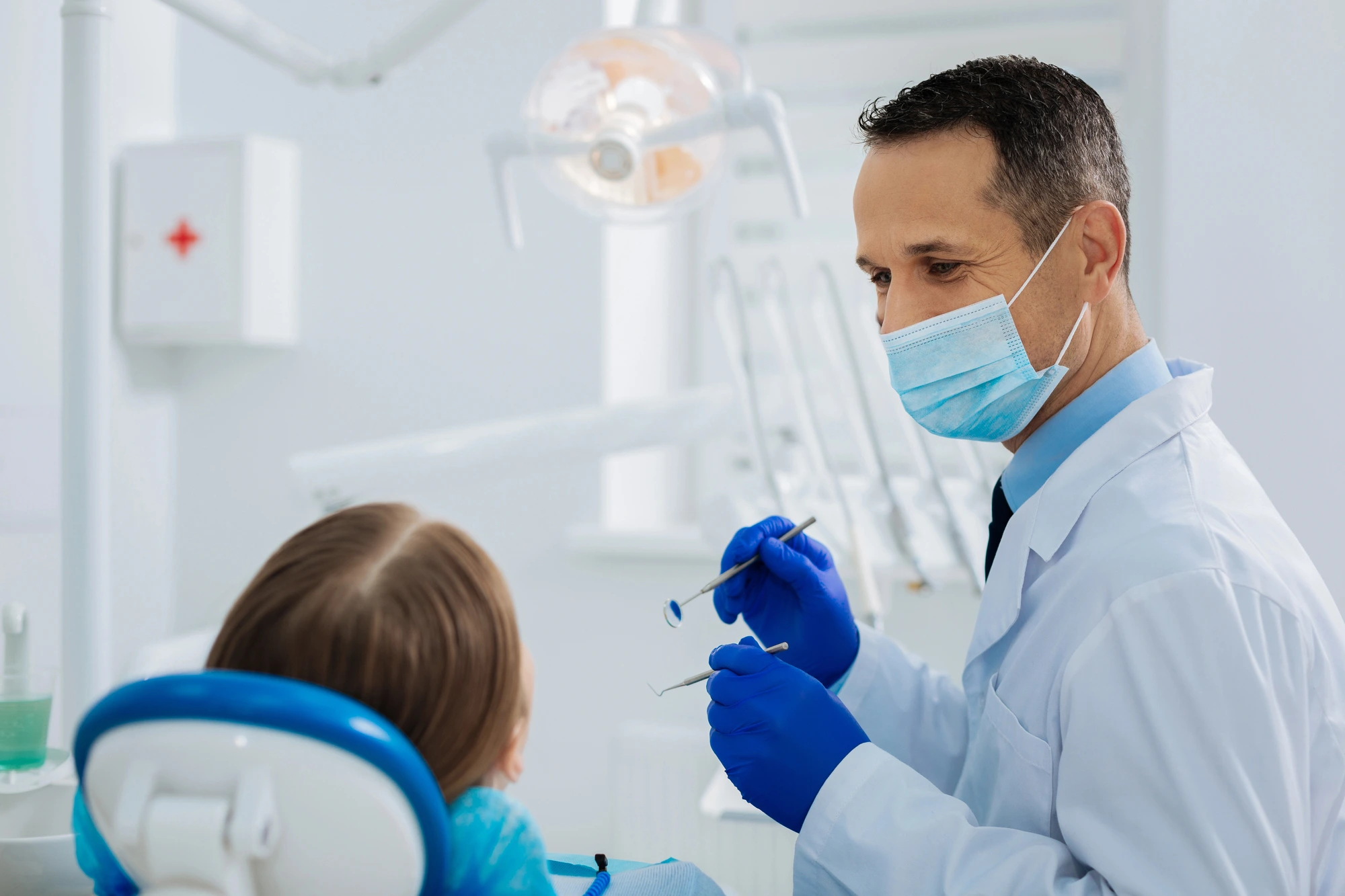 dentist-treating-patient-gum-disease-treatment-Richmond