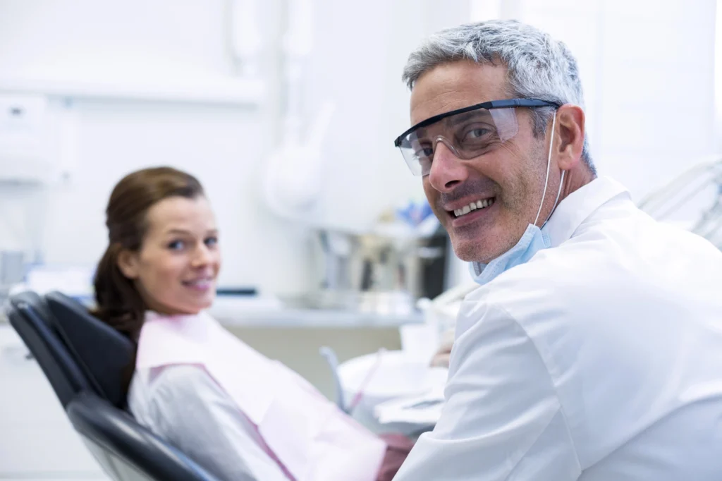 dentist and patient talking about dental implants in Short Pump