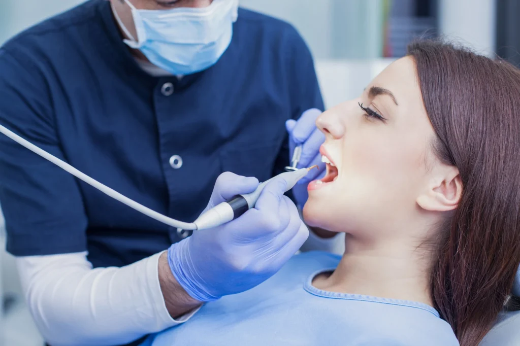 woman getting a teeth cleaning in Richmond