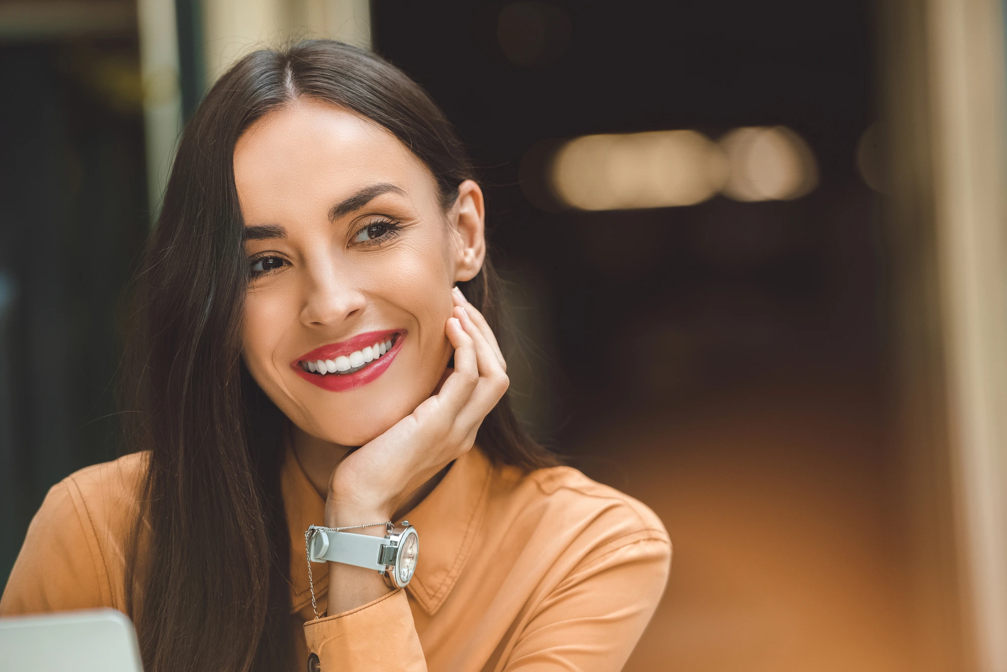 happy woman after teeth whitening in Richmond