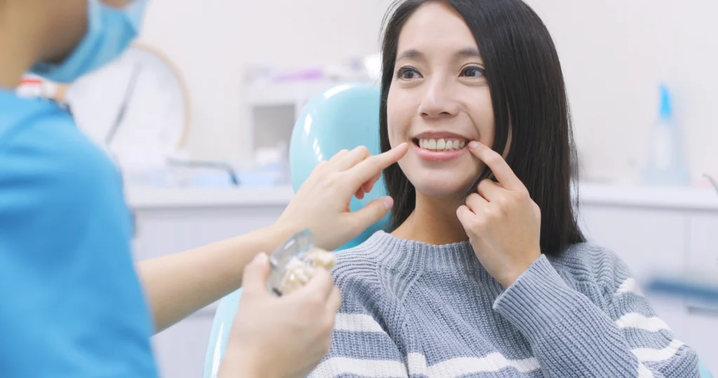 patient and dentist discussing dental implants in Richmond